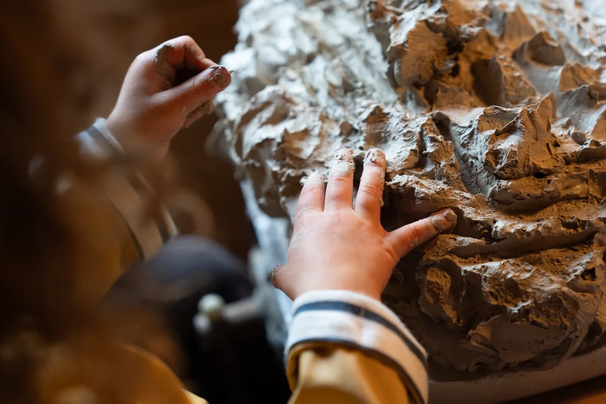 Little hands getting creative with clay