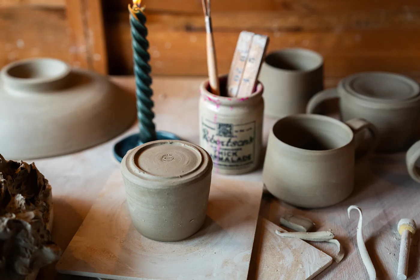 Isa’s handmade pottery on her studio workbench